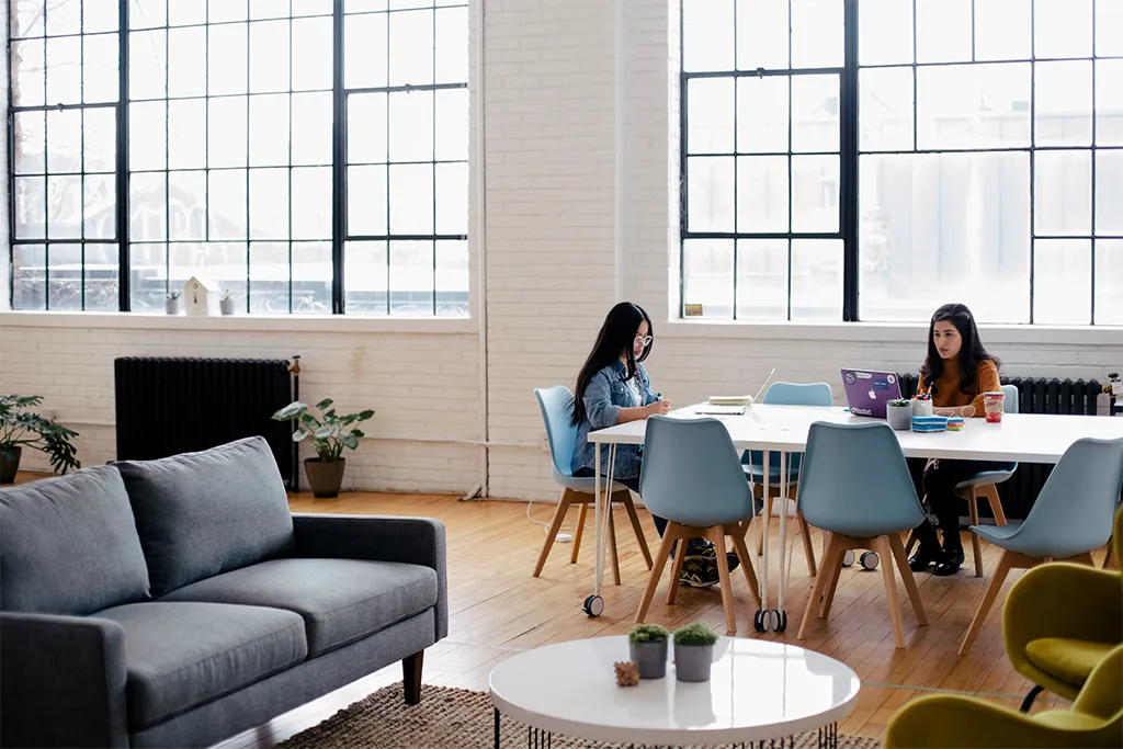 Kyma AI team collaborating in a business strategy meeting